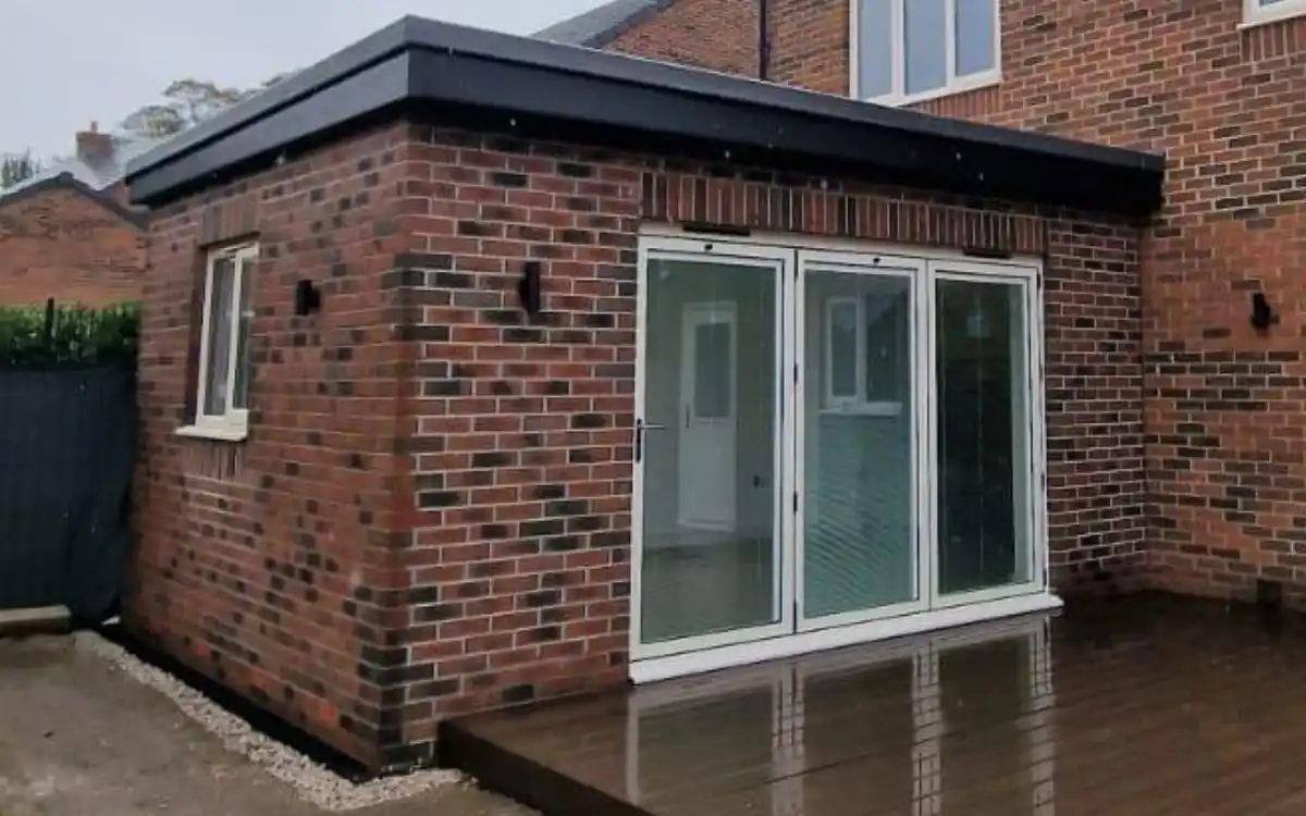 Completed brick slip exterior finish on a Betta Space Superstrux™ home extension — indistinguishable from traditional brickwork