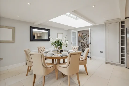 Superstrux home extension with lantern roof flooding the space with natural light